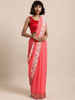 Celebrate This Festive Season In This Pretty Saree In Pink Color Paired With Red Colored Blouse, This Pretty Saree Is Georgette Based Paired With Art Silk Fabricated Blouse. It Is Light In Weight And Easy To Carry All Day Long. 