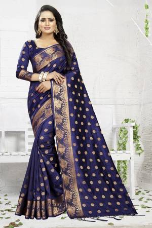 Celebrate This Festive Season Wearing This Designer Silk Based Saree In Navy Blue Color. This Saree And Blouse Are Fabricated On Banarasi Art Silk Beautified With Weave. It Is Light Weight, Durable And Easy To Carry All Day Long. Buy Now.