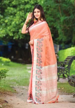 Flaunt Your Rich And Elegant Taste Wearing This Pretty Saree In Peach Color Paired With Peach Colored Blouse. This Saree And Blouse Are Fabricated On Linen Beautified With Floral Weave. It Is Light In Weight And Gives A Rich Look To Your Personality. 