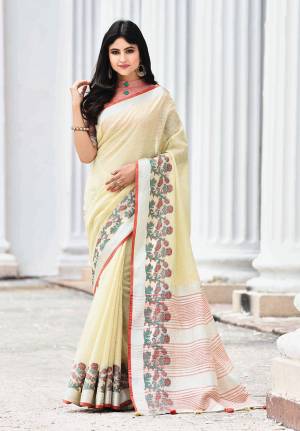 Celebrate This Festive Season with beauty and Comfort In This Lovely Cream Colored saree Paired With Red Colored Blouse. This Saree And Blouse Are Fabricated On Linen Which Gives A Rich And Elegant Look. Buy This Pretty Saree Now.