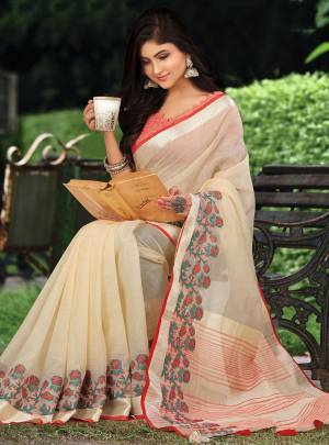 Celebrate This Festive Season with beauty and Comfort In This Lovely Cream Colored saree Paired With Red Colored Blouse. This Saree And Blouse Are Fabricated On Linen Which Gives A Rich And Elegant Look. Buy This Pretty Saree Now.