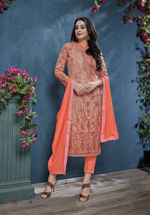 Add This Pretty Designer Straight Suit To Your Wardrobe In Orange Color. This Petty Semi-Stitched Suit Is Cotton Based Paired With Santoon Bottom And Chiffon Dupatta. Its Top Is Beautified With Prints And Tone To Tone Resham Embroidery. Buy Now.