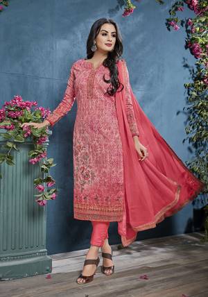 Add This Pretty Designer Straight Suit To Your Wardrobe In Old Rose Pink Color. This Petty Semi-Stitched Suit Is Cotton Based Paired With Santoon Bottom And Chiffon Dupatta. Its Top Is Beautified With Prints And Tone To Tone Resham Embroidery. Buy Now.
