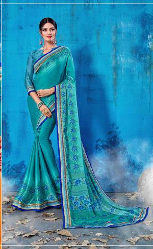 For Your Semi-Casual Wear, Grab This Pretty Saree In Blue Color Paired With Blue Colored Blouse. This Saree And Blouse Are Fabricated On Soft Silk Beautified With Prints All Over. This Saree Is Light Weight, Soft Towards Skin And Easy To Carry All Day Long. 