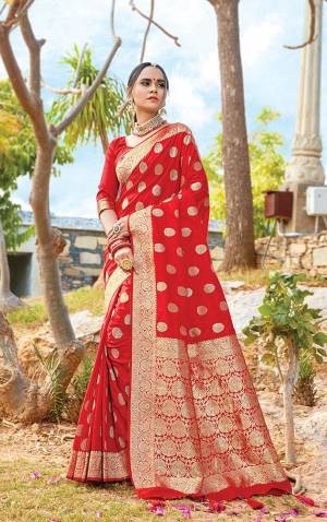 Get Ready For The Upcoming Wedding & Festive Season With This Pretty Saree In Red Color Paired With Red Colored Blouse. This Saree And Blouse Are Fabricated On Art Silk Beautified With Weave All Over. Its Lovely Color and Weave Will Give An Attractive Look To Your Personality. 