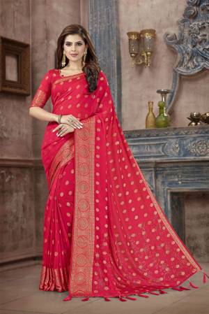 Celebrate This Festive Season In This Attractive Rani Pink Colored Saree. This Saree And Blouse Are Fabricated On Art Silk Beautified With Weaving And Stone Work. This Silk Based Saree Gives A Rich Look To Your Personality. 