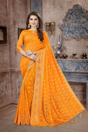 Celebrate This Festive Season In This Attractive Orange Colored Saree. This Saree And Blouse Are Fabricated On Art Silk Beautified With Weaving And Stone Work. This Silk Based Saree Gives A Rich Look To Your Personality. 