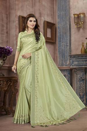 You Will Definitely Earn Lots Of Compliments Wearing This Designer Saree In Pastel Green Color. This Pretty Saree And Blouse Are Silk Fabricated on Manipuri Art Silk Beautified With Attractive Stone Work Giving It A Rich And Subtle Look. Buy Now.