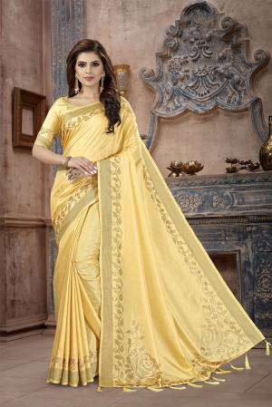 You Will Definitely Earn Lots Of Compliments Wearing This Designer Saree In Yellow Color. This Pretty Saree And Blouse Are Silk Fabricated on Manipuri Art Silk Beautified With Attractive Stone Work Giving It A Rich And Subtle Look. Buy Now.