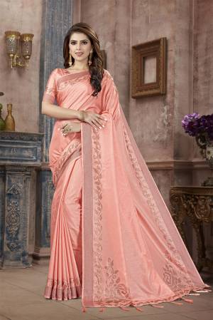 You Will Definitely Earn Lots Of Compliments Wearing This Designer Saree In Peach Color. This Pretty Saree And Blouse Are Silk Fabricated on Manipuri Art Silk Beautified With Attractive Stone Work Giving It A Rich And Subtle Look. Buy Now.