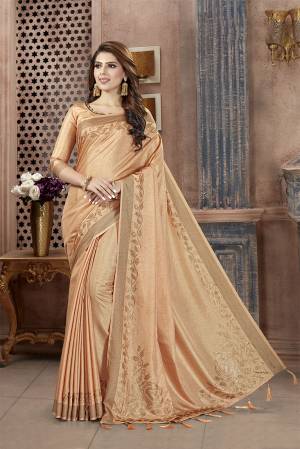 You Will Definitely Earn Lots Of Compliments Wearing This Designer Saree In Beige Color. This Pretty Saree And Blouse Are Silk Fabricated on Manipuri Art Silk Beautified With Attractive Stone Work Giving It A Rich And Subtle Look. Buy Now.