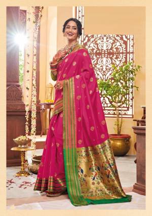 Shine Bright Wearing This Attractive Looking Saree In Rani Pink Color Paired With Contrasting Green Colored Blouse. This Saree And Blouse Are Fabricated On Banarasi Art Silk Beautified With Weave. Buy This Saree Now.