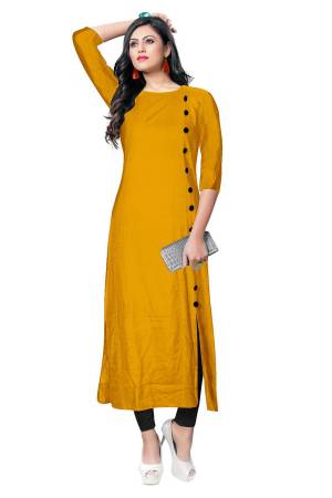 For Your Casual Wear, Grab This Simple And Elegant Looking Readymade Kurti In Musturd Yellow Color Fabricated On Rayon. It Is Beautified With Contrasting Buttons With A Front Side Slit. Its Fabric Is Soft Towards Skin And Available In All Regular Sizes. Buy This Pretty Kurti Now.