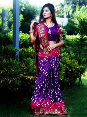 Here Is A Beautiful Bandhej Designer Saree In Purple And Pink Color. This Saree And Blouse Are Fabricated On Art Silk Which Also Gives A Rich Look To Your Personality. Buy Now.