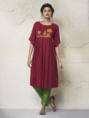 Celebrate This Festive Season With Beauty And Comfort Wearing This Pretty Readymade Kurti In Maroon Color Fabricated On Rayon. It Has Beautiful Pattern Which Will Earn You Lots Of Compliments From Onlookers. 