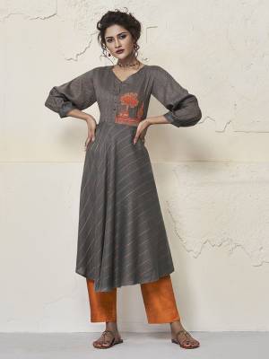 You Will Definitely Earn Lots Of Compliments Wearing This Designer Readymade Kurti In Grey Color Fabricated On Rayon. It Is Soft Towards Skin And Easy To Carry All Day Long. 