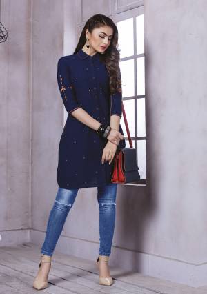 You Will Definitely Earn Lots Of Compliments Wearing This Designer Stylish Readymade Kurti In Navy Blue Color Fabricated On Cotton. You Can Pair This Up With Denim, Pants Of Leggings. 