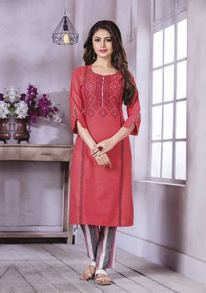 Here Is A Pretty Kurti For Your Semi-Casuals In Red Color Fabricated On Cotton. It Is Beautified With Prints And Thread Work And Available In All Regular Sizes. 
