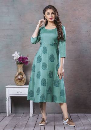 Add This Pretty Readymade Kurti To Your Wardrobe In Turquoise Blue Color Fabricated On Cotton. It Is Beautified With Prints And Thread Work. Also It Is Available In All Regular Sizes. Buy Now.