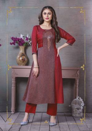 Here Is A Lovely Readymade Kurti To Add Into Your Wardrobe In Maroon Color. This Kurti Is Rayon Based Beautified With Prints And Thread Work. Buy Now.