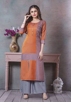 Add This Pretty Readymade Kurti To Your Wardrobe In Turquoise Orange Color Fabricated On Rayon. It Is Beautified With Prints And Thread Work. Also It Is Available In All Regular Sizes. Buy Now.