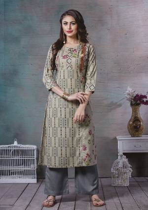 For Your Semi-Casuals, Grab This Readymade Kurti In Olive Green Color. This Kurti Is Fabricated On Rayon Cotton Beautified With Prints And Thread Work. It Is Light In Weight And Easy To Carry All Day Long. 