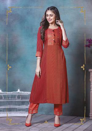 For Your Semi-Casuals, Grab This Readymade Kurti In Red Color. This Kurti Is Fabricated On Rayon Beautified With Prints And Thread Work. It Is Light In Weight And Easy To Carry All Day Long. 