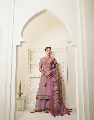 Look Pretty In This Designer Straight Suit In Pink Color. Its Top IS Fabricated On Satin Georgette Paired With Santoon Bottom And A Very Beautiful Digital Printed Jacquard Silk Dupatta. Buy Now.