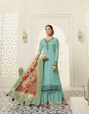 Grab This Very Beautiful Suit In Lovely Sky Blue Color. This Beautiful Straight Suit In Fabricated On Satin Georgette Paired With Santoon Bottom And Jacquard Silk Fabricated Digital Printed Dupatta. 