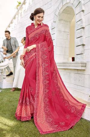 Look Beautiful Wearing This Designer Saree In Dark Pink Color. This Saree Is Fabricated On Satin And Brasso Paired With Art Silk Fabricated Blouse. Its Beautiful Embroidery, Color And Brasso Highlight Will Earn You Lots Of Compliments From Onlookers. 