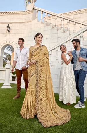 Flaunt Your Rich and Elegant Taste Wearing This Elegant Designer Saree In Beige Color. This Saree Is Fabricated On Slub Silk And Brasso Paired With Art Silk Fabricated Blouse. This Saree Is Light Weight And Easy To Carry All Day Long. 