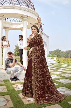 For A Royal Look, Grab This Heavy Designer Saree In Brown Color Paired With Brown Colored Blouse. This Saree Is Fabricated On Georgette And Brasso Paired With Art Silk Fabricated Blouse. It Is Beautified With Pretty Thread And Stone Work. Buy Now.