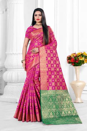 For A Proper Traditional Look With Traditional Color Pallete, Grab This Designer Saree In Rani Pink Color. This Saree Is Fabricated On Banarasi Art Silk Beautified With Checks Pattern Paired With art Silk Fabricated Blouse.?