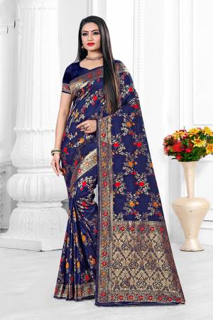 Go With The Pretty Shades With This Designer Floral Patterned Saree In Navy Blue Color. This Saree Is Banarasi Art Silk Based Paired With Art Silk Fabricated Blouse. Buy Now