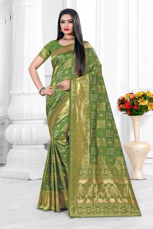 For A Proper Traditional Look With Traditional Color Pallete, Grab This Designer Saree In Light Green Color. This Saree Is Fabricated On Banarasi Art Silk Beautified With Checks Pattern Paired With art Silk Fabricated Blouse.?