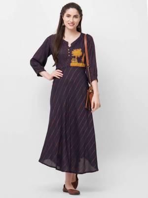 Enhance Your Personality Wearing This Readymade Kurti In Navy Blue Color Fabricated On Rayon, It Is Soft Towards Skin And Easy To Carry All Day Long. 