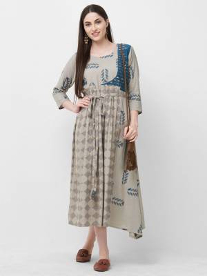 Simple And Elegant Looking Readymade Kurti Is Here In Grey Color Fabricated On Rayon. Its Rich Fabric And Color Will Earn You Lots Of Compliments From Onlookers. 