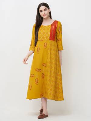 For Your Semi-Casual Wear, Grab This Readymade Kurti In Yellow Color Fabricated On Rayon. This Kurti Is Light Weight, Durable And Easy To Carry All Day Long. 