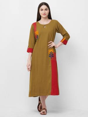 Add Some Casual Or Semi-Casual Wear To Your Wardrobe With This Readymade Kurti In Pear Green Color Fabricated On Rayon. It Is Light In Weight And Easy To Carry All day Long.