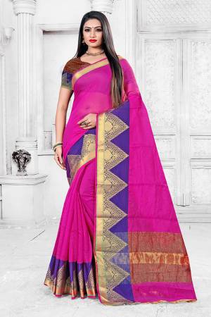 Adorn A Proper Traditional Look This Festive Season Wearing This Pretty Saree In Rani Pink Color Paired With Maroon Colored Blouse. This Saree Is Fabricated on Cotton Silk Paired With Art Silk Fabricated Blouse. Buy This Lovely Saree Now. 