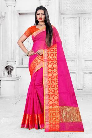Enhance Your Personality Wearing This Silk Based Saree In Rani Pink Color Paired With Orange Colored Blouse. This Pretty Weaved Saree Is Fabricated On Cotton Silk Paired With Art Silk Fabricated Blouse. Buy Now.