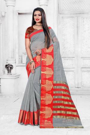 Adorn A Proper Traditional Look This Festive Season Wearing This Pretty Saree In Grey Color Paired With Maroon Colored Blouse. This Saree Is Fabricated on Cotton Silk Paired With Art Silk Fabricated Blouse. Buy This Lovely Saree Now. 