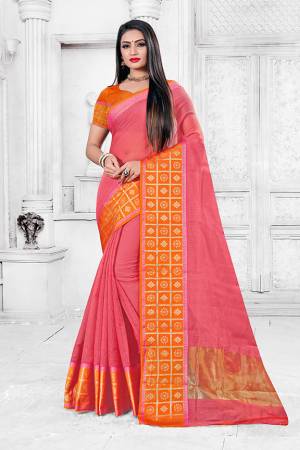 Enhance Your Personality Wearing This Silk Based Saree In Pink Color Paired With Orange Colored Blouse. This Pretty Weaved Saree Is Fabricated On Cotton Silk Paired With Art Silk Fabricated Blouse. Buy Now.
