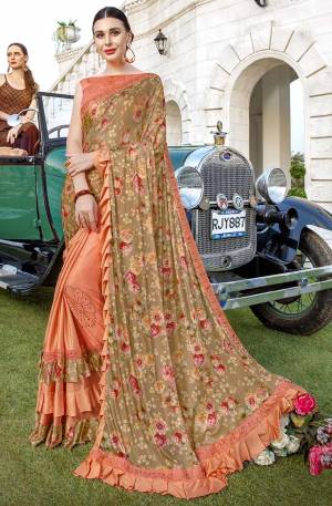 Get Ready For The Upcoming Festive And Wedding Season With This Very Beautiful Designer Saree In Beige And Light Orange Color Paired With Light Orange Colored Blouse. This Saree IS Lycra Based Beautified With Prints And Stone Work Paired With Art Silk Fabricated Blouse. Buy Now.