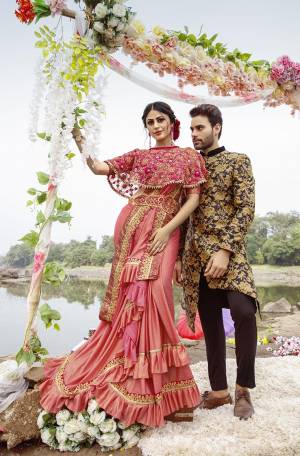 For A Royal Look, Grab This Designer Fancy Saree With Cape In Pink Color. This Pretty Saree Is Fabricated On Lycra Paired With Art Silk Fabricated Blouse And Embroidered Net Fabricated Cape. Its Trendy Pattern And Design Will Earn You Lots Of Compliments From Onlookers.