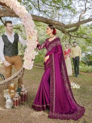 For A Royal Elegant Look, Grab This Designer Saree In Purple Color Paired With Purple Colored Blouse. This Saree Is Fabricated On Satin Georgette Paired With Art Silk And Net Fabricated Blouse. Its Rich Color Pallete And Fabric Will Definitely Earn You Lots Of Compliments From Onlookers.