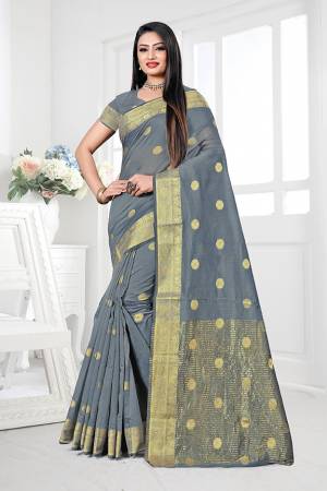 Enhance Your Personality Wearing This Silk Based Saree In Grey Color. This Pretty Weaved Saree Is Fabricated On Cotton Silk Paired With Art Silk Fabricated Blouse. Buy Now.
