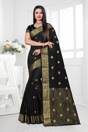 Adorn A Proper Traditional Look This Festive Season Wearing This Pretty Saree In Black Color. This Saree Is Fabricated on Cotton Silk Paired With Art Silk Fabricated Blouse. Buy This Lovely Saree Now.