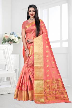 Adorn A Proper Traditional Look This Festive Season Wearing This Pretty Saree In Peach Color. This Saree Is Fabricated on Cotton Silk Paired With Art Silk Fabricated Blouse. Buy This Lovely Saree Now.