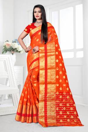 Adorn A Proper Traditional Look This Festive Season Wearing This Pretty Saree In Bright Orange Color. This Saree Is Fabricated on Cotton Silk Paired With Art Silk Fabricated Blouse. Buy This Lovely Saree Now.